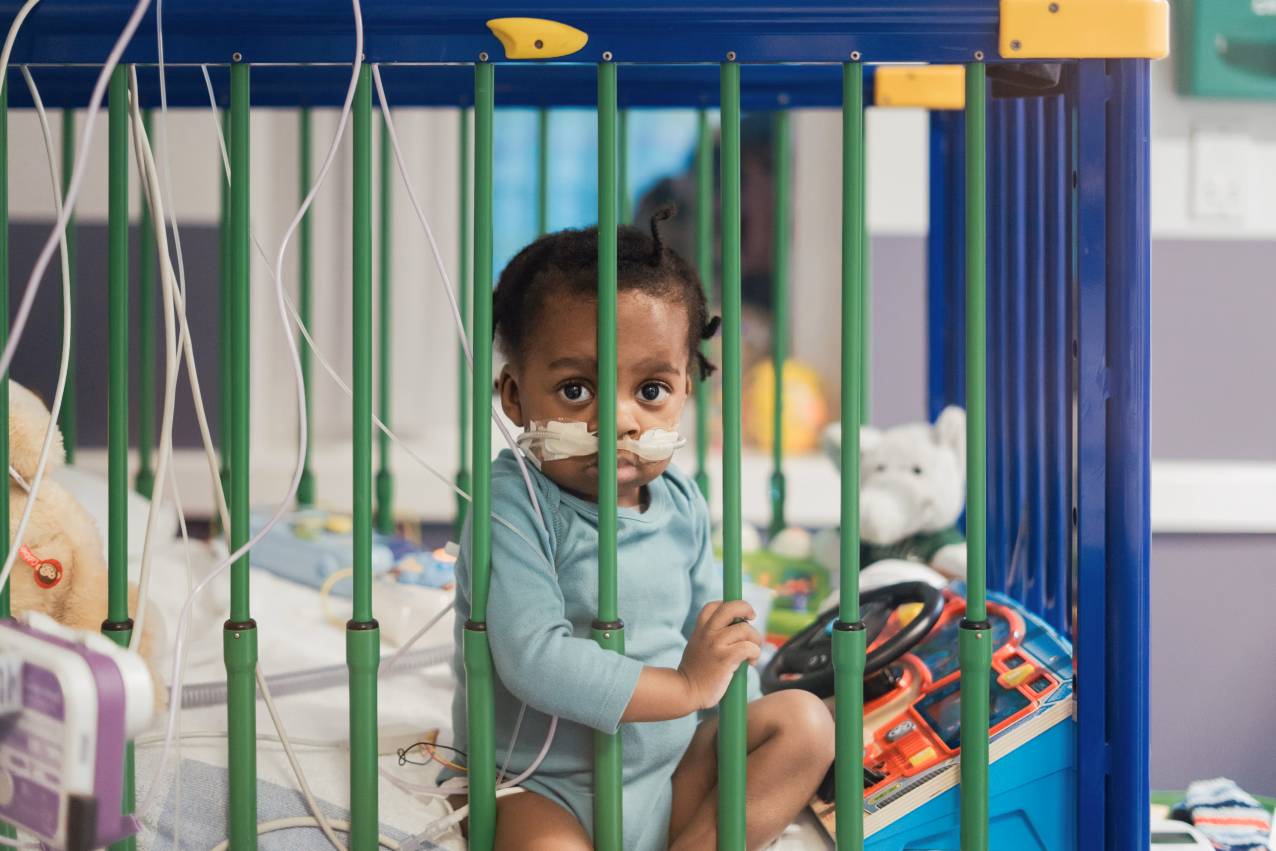 Baby patient in cot in the hospital